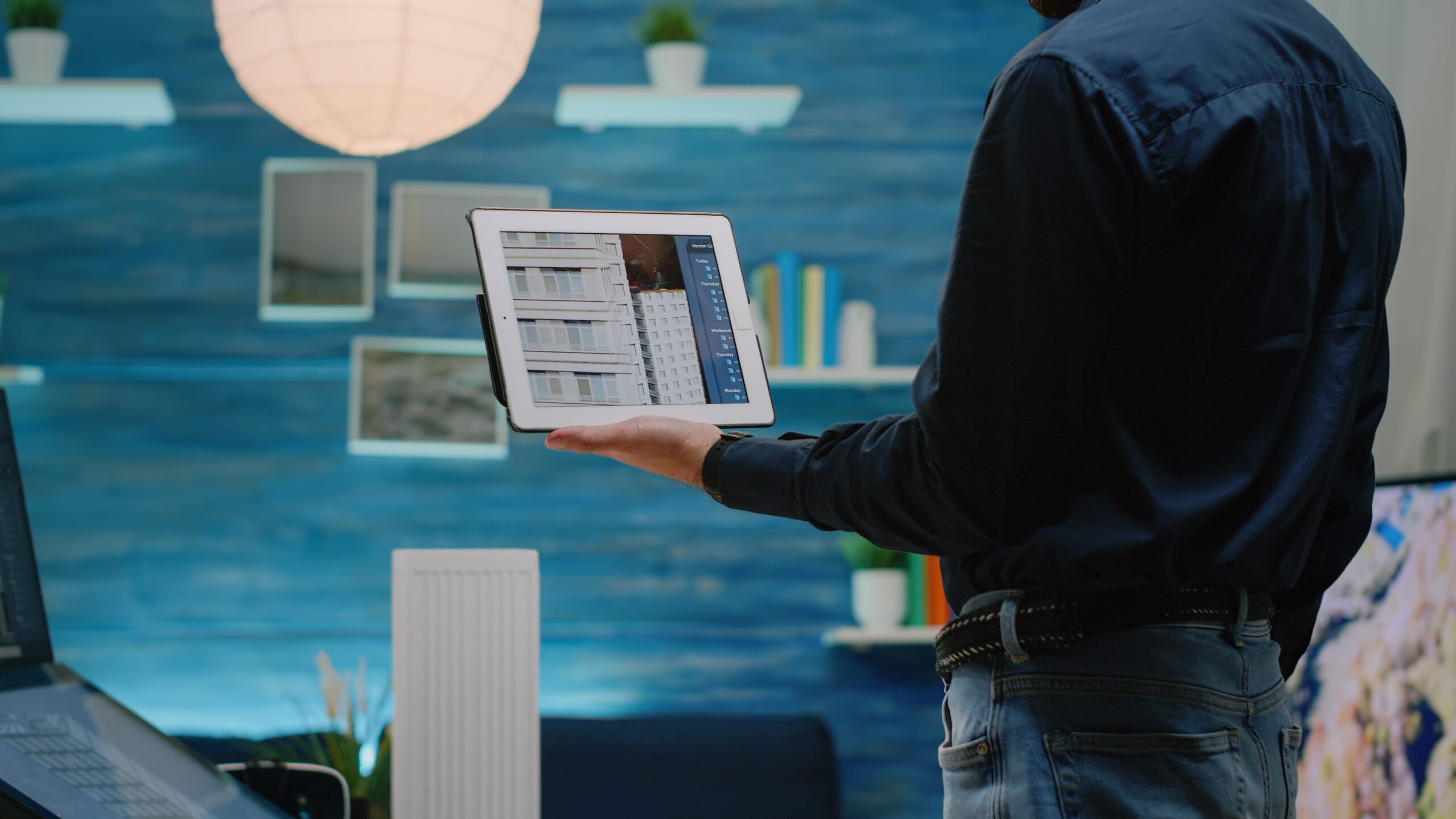 Close up of architect using tablet with touch screen